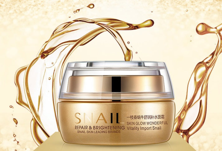 Skincare cream jar with snail shell design on a gold background