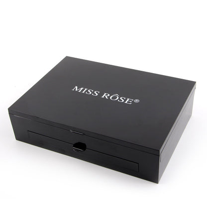 Black cosmetic box with 'MISS ROSE' branding on a white background