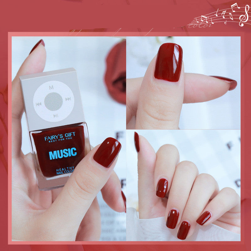 Red nail polish with a music-themed packaging and application on nails.