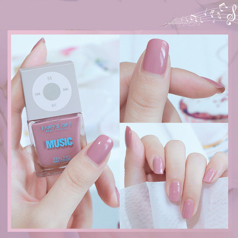 Pink nail polish with 'Music' design and application on nails